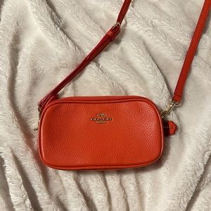COACH crossbody clutch in pebbled leather